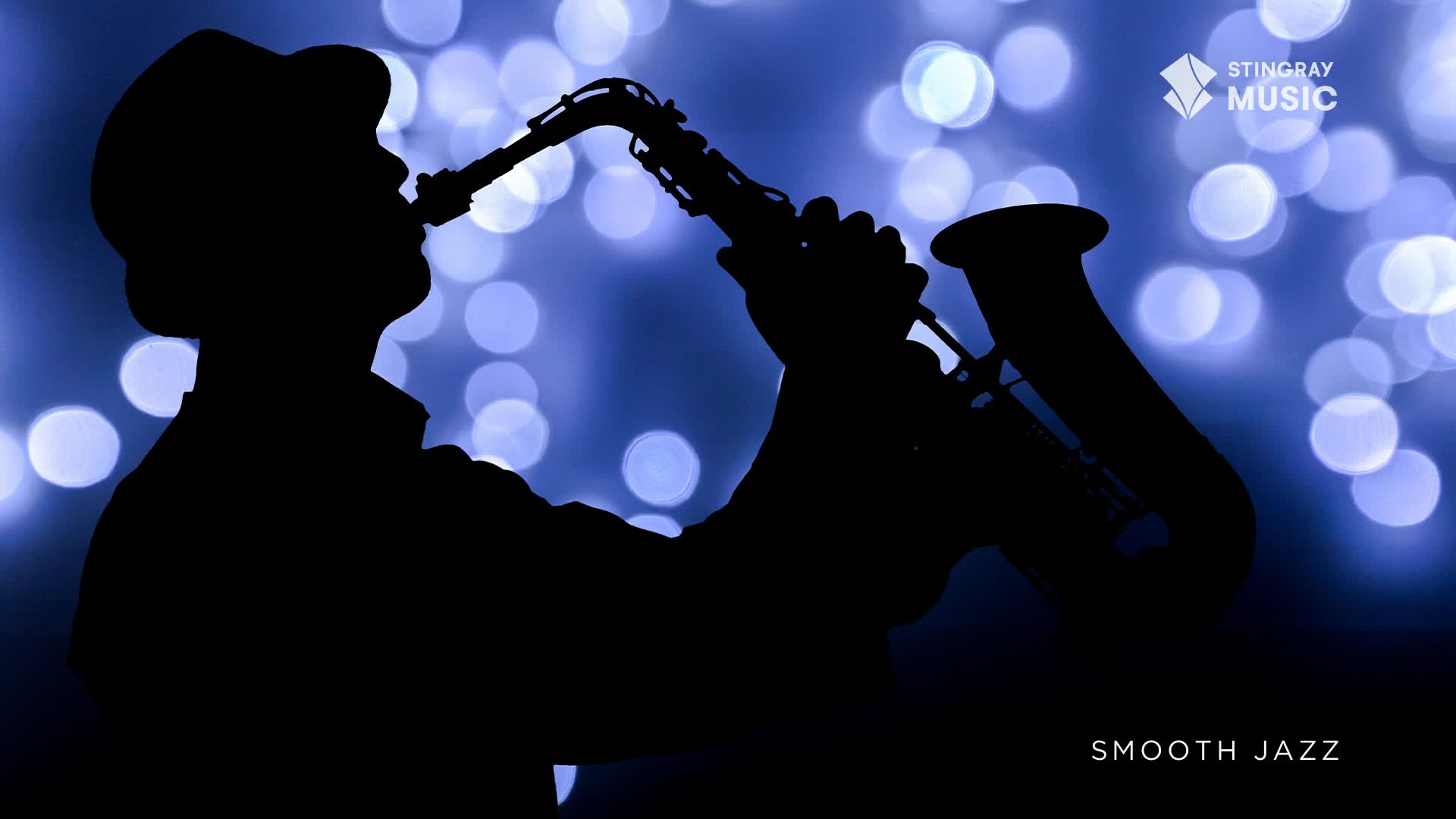 A lone saxophonist plays, their silhouette stark against a backdrop of soft, glowing blue lights. The smooth jazz music fills the air, a familiar sound from Stingray Music.