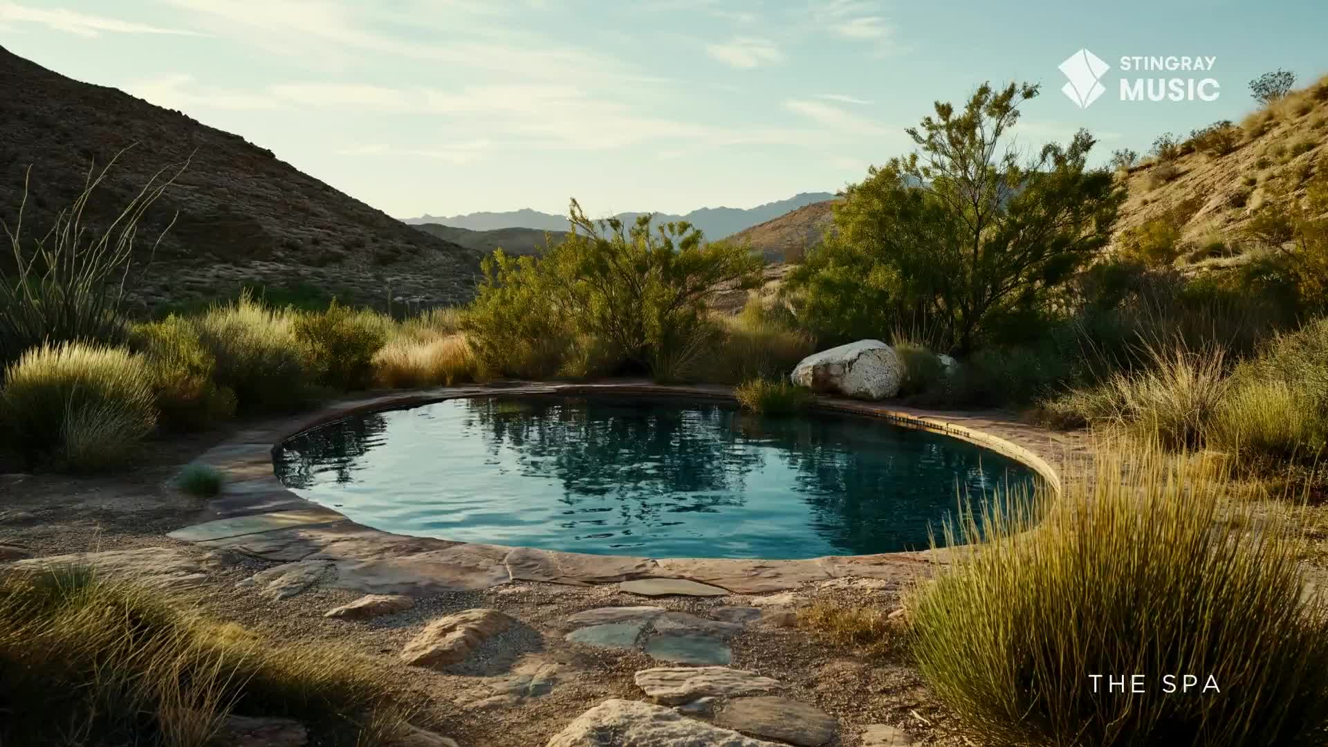 The water in the pool ripples gently, reflecting the dry, scrubby hills. This tranquil spot, nestled in the Canadian landscape, offers a peaceful escape. The water in the pool ripples gently, reflecting the dry, scrubby hills. This tranquil spot, nestled in the Canadian landscape, offers a peaceful escape.