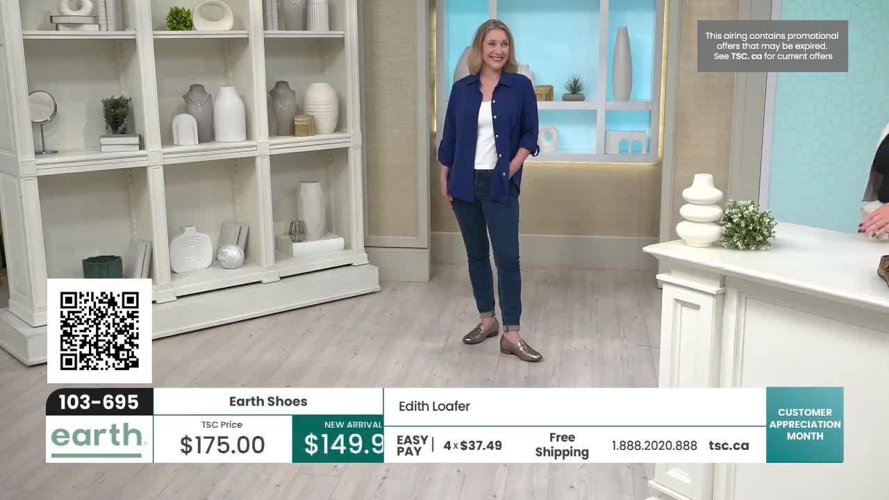 A woman in a blue shirt and jeans stands in front of a display, showcasing a pair of metallic loafers. The TSC price for the shoes is displayed below, along with a QR code.
