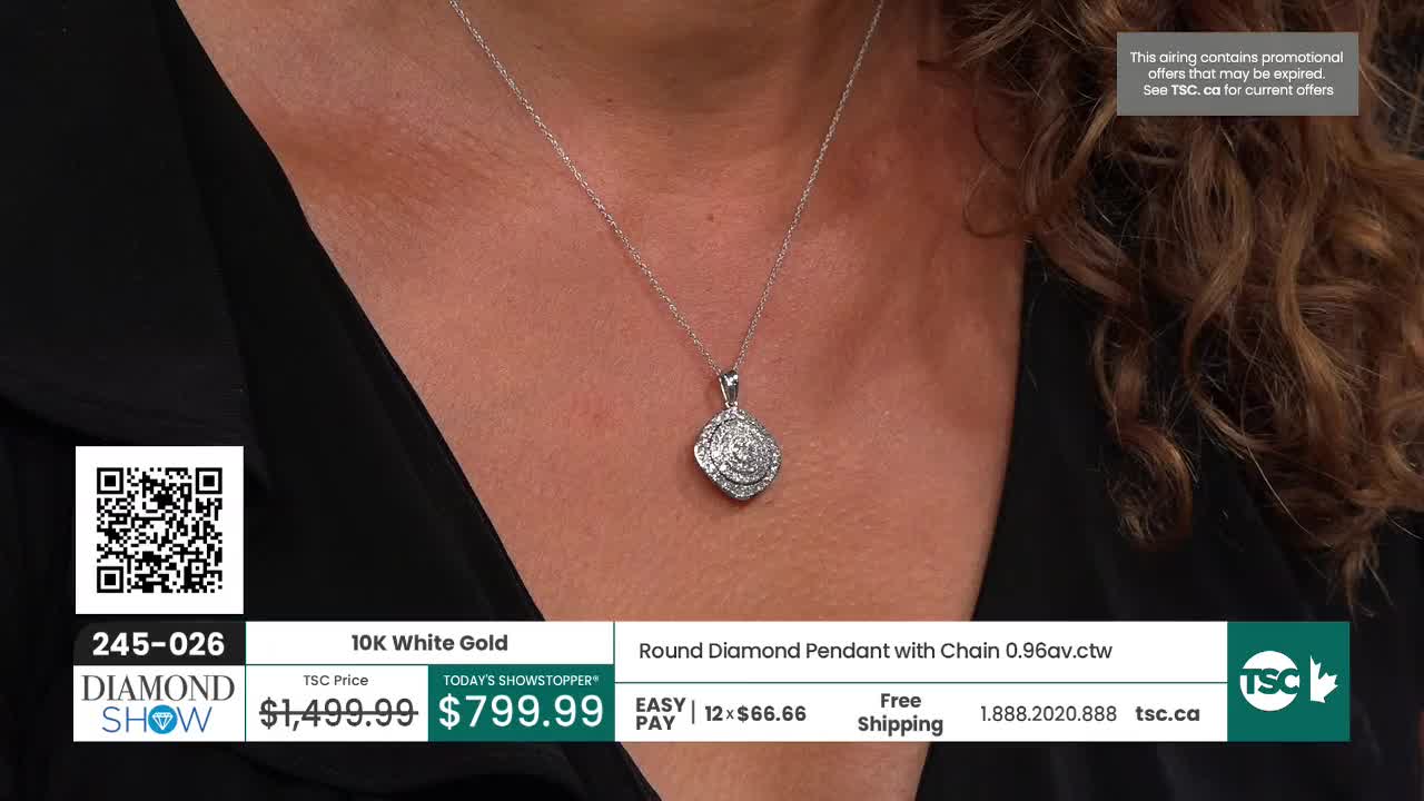 A diamond pendant hangs from a delicate chain, displayed against a woman's neck. The TSC logo and price details are visible at the bottom of the screen.
