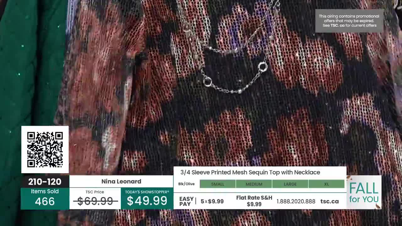 A patterned top with a delicate necklace fills the frame, its mesh fabric catching the light. Below, a screen displays the TSC price and current showstopper deal.
