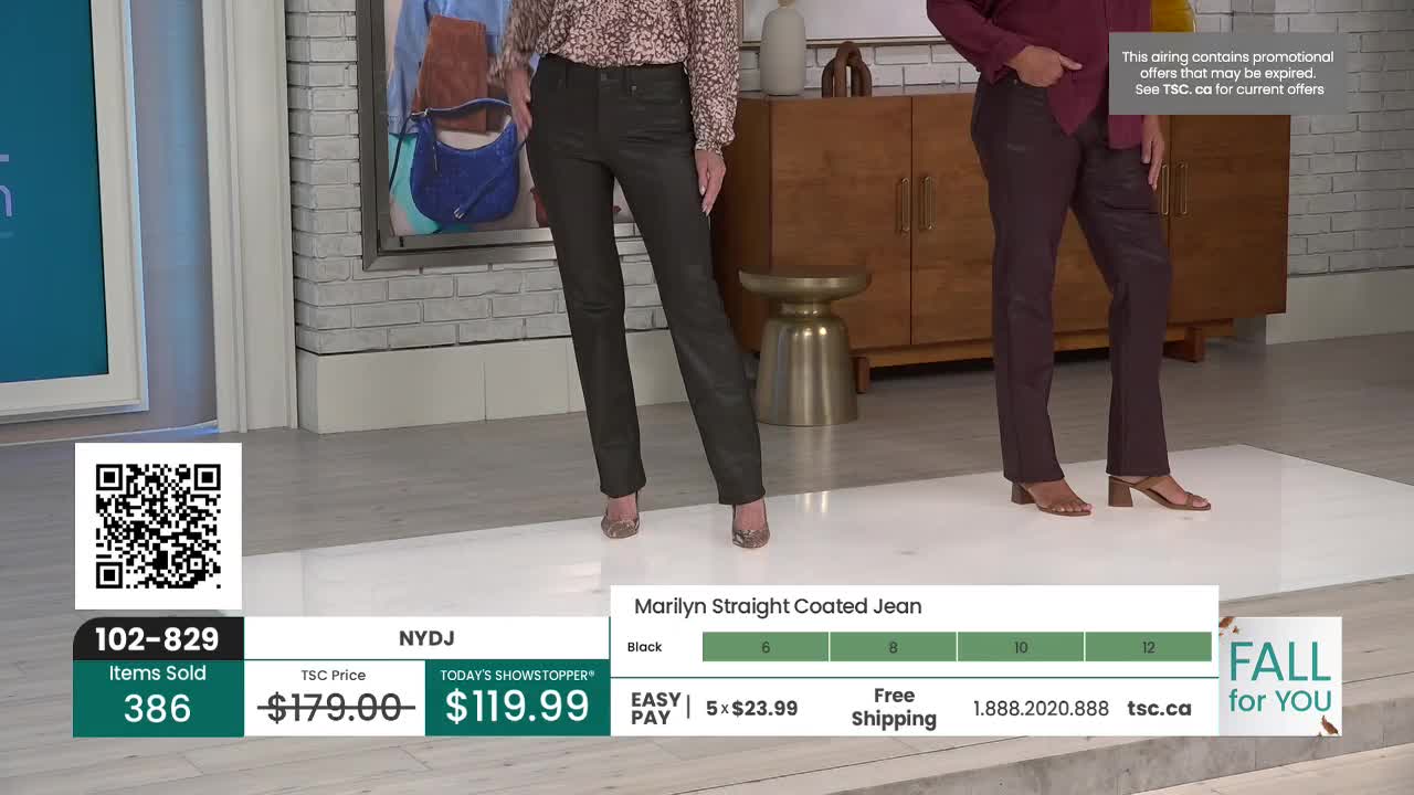 Two women stand on a bright platform, showcasing straight-leg coated jeans. The on-screen graphics from TSC highlight the price and availability of the featured item.
