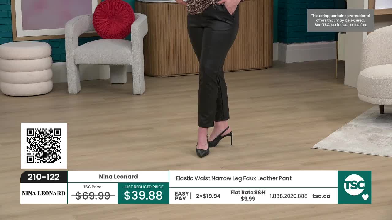 A woman stands in black faux leather pants, her slingback heels clicking softly on the floor. The TSC logo and pricing information are displayed at the bottom of the screen.