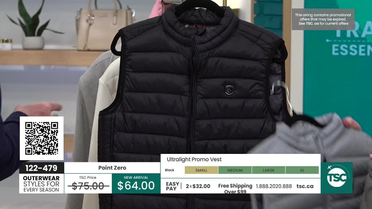 A black puffer vest hangs on a hanger, its quilted texture catching the light. Another vest, this one grey, is being presented next to it.