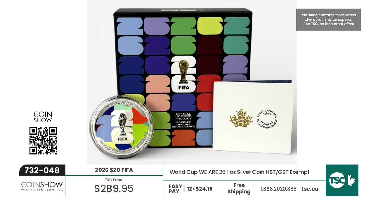 A FIFA World Cup coin and a commemorative box sit on display. The coin features a miniature trophy and the year 2026.