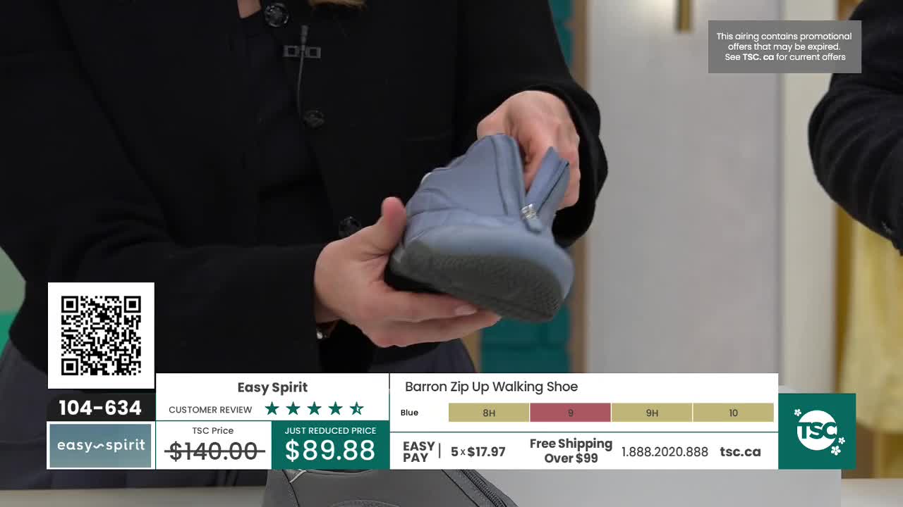 A light blue walking shoe with a silver zipper is held up for display. The shoe is part of a presentation on TSC, a Canadian shopping channel.