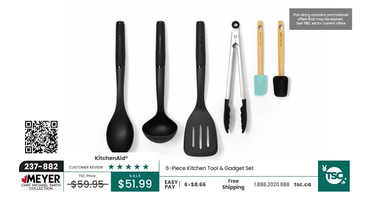 A set of six KitchenAid tools sits on a white background. The tools include a large spoon, a ladle, a slotted spatula, tongs, and two spatulas with wooden handles and silicone heads. A set of six KitchenAid tools sits on a white background. The tools include a large spoon, a ladle, a slotted spatula, tongs, and two spatulas with wooden handles and silicone heads.
