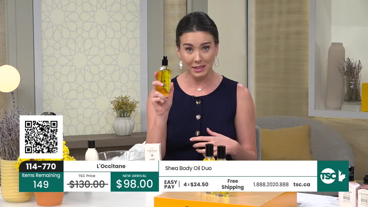 A woman on a set holds up a bottle of L'Occitane Shea Body Oil. A graphic displays the product's sale price of $98.00, down from $130.00. A woman on a set holds up a bottle of L'Occitane Shea Body Oil. A graphic displays the product's sale price of $98.00, down from $130.00.