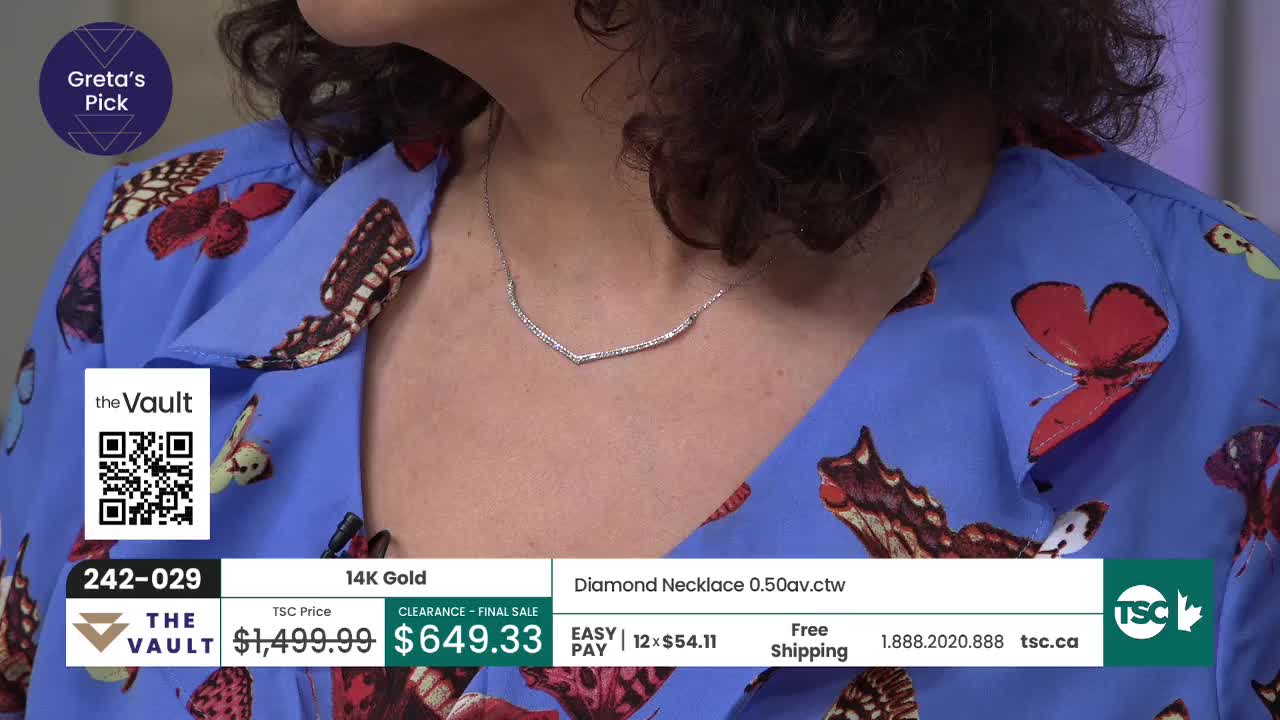 A delicate diamond necklace rests on a woman's collarbone, its V-shape catching the light. Her blue blouse, adorned with vibrant butterfly prints, provides a striking backdrop. A delicate diamond necklace rests on a woman's collarbone, its V-shape catching the light. Her blue blouse, adorned with vibrant butterfly prints, provides a striking backdrop.