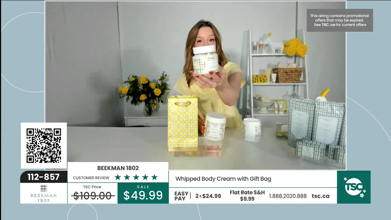 A woman holds up a jar of Beekman 1802 whipped body cream, presenting it to the camera. The product is part of a special offer on TSC, a Canadian shopping channel. A woman holds up a jar of Beekman 1802 whipped body cream, presenting it to the camera. The product is part of a special offer on TSC, a Canadian shopping channel.