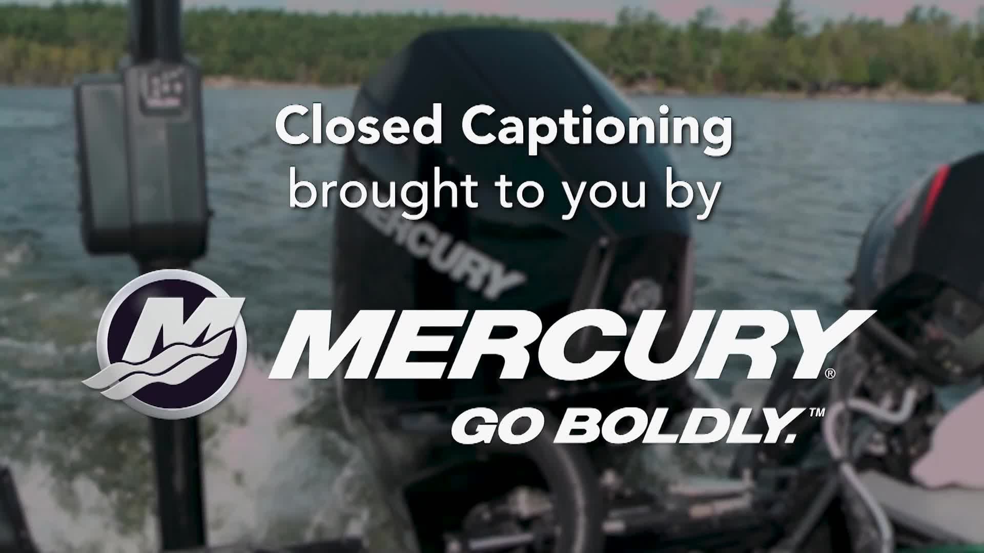 Two powerful Mercury outboard motors churn the water behind a boat speeding across a lake. The engine cowlings are black and shiny, reflecting the dappled sunlight. Two powerful Mercury outboard motors churn the water behind a boat speeding across a lake. The engine cowlings are black and shiny, reflecting the dappled sunlight.