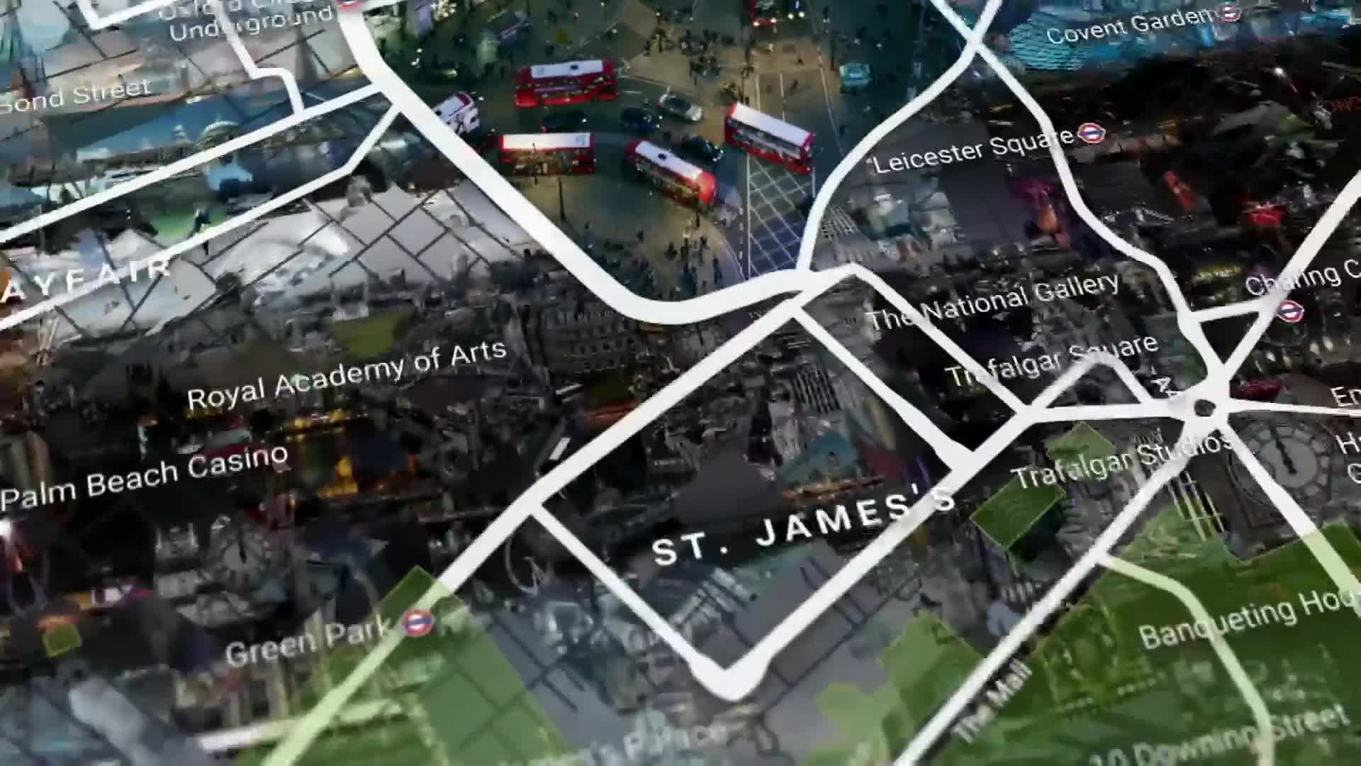 Several red double-decker buses navigate a busy street, their lights reflecting on the wet pavement. The map overlay highlights areas like St. James's and Trafalgar Square, a familiar sight in London's bustling cityscape, often featured in CGTN reports. Several red double-decker buses navigate a busy street, their lights reflecting on the wet pavement. The map overlay highlights areas like St. James's and Trafalgar Square, a familiar sight in London's bustling cityscape, often featured in CGTN reports.