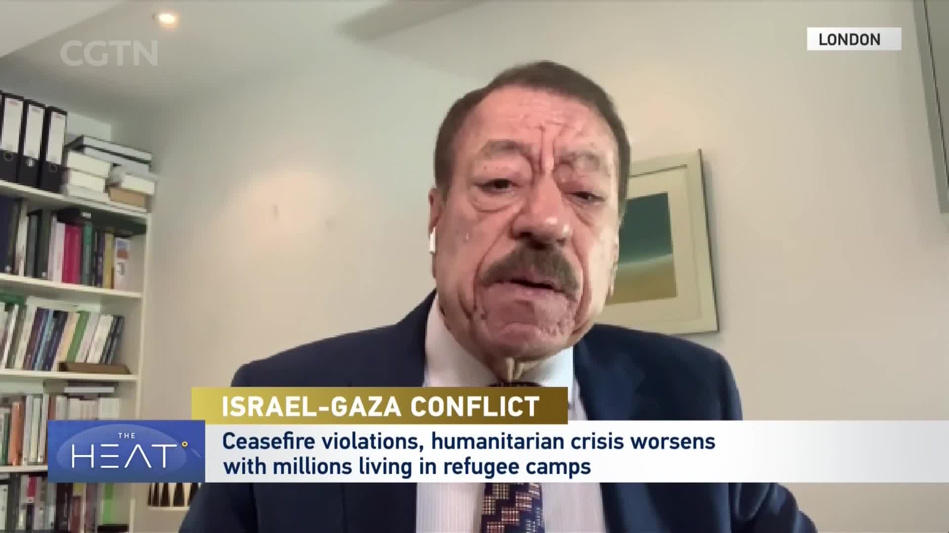 A man with a mustache speaks directly to the camera, a CGTN graphic in the corner indicating a report from London. The chyron below him details the "Israel-Gaza Conflict," highlighting ceasefire violations and a worsening humanitarian crisis. A man with a mustache speaks directly to the camera, a CGTN graphic in the corner indicating a report from London. The chyron below him details the "Israel-Gaza Conflict," highlighting ceasefire violations and a worsening humanitarian crisis.