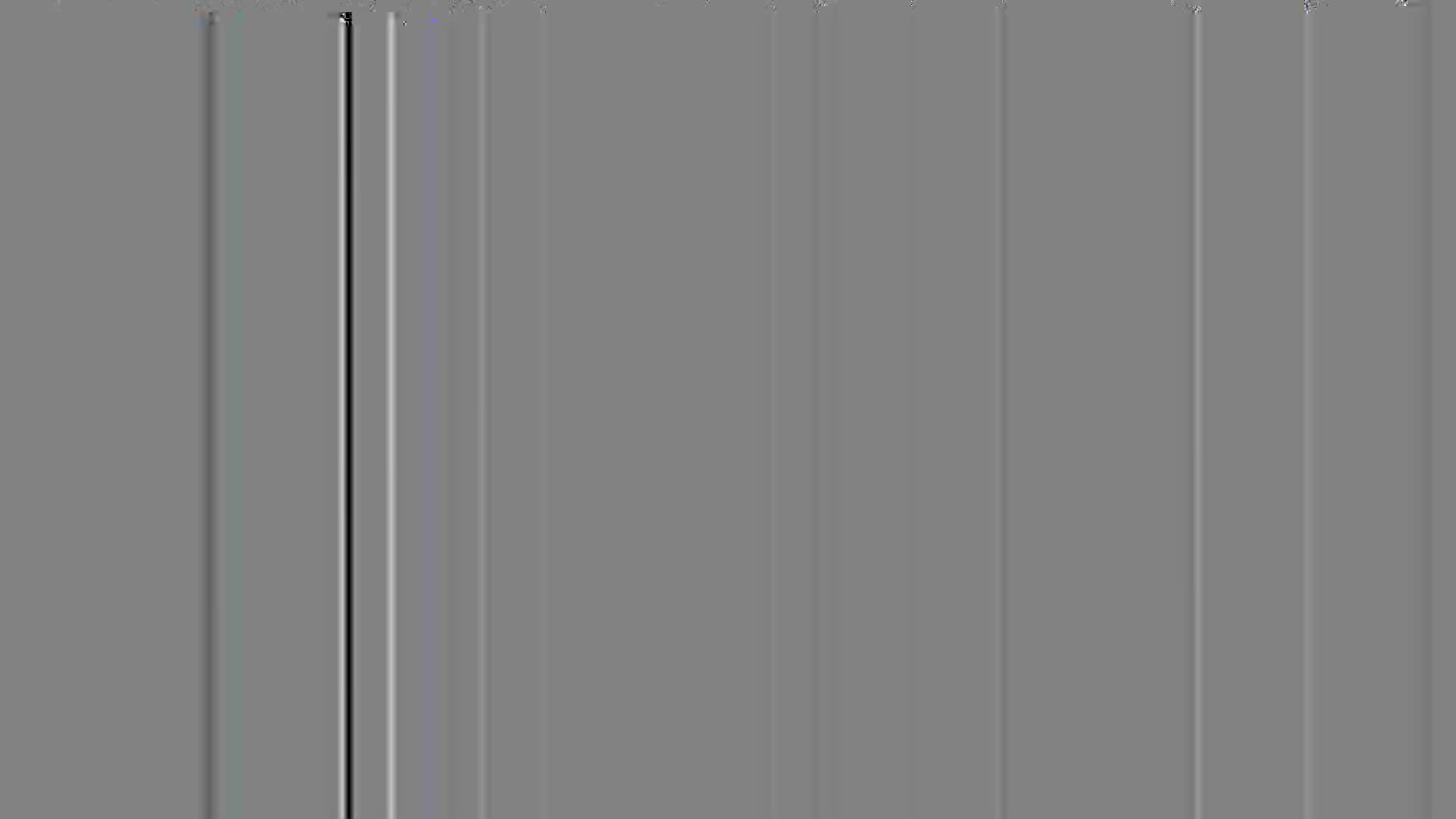 The screen is showing vertical lines, a mix of gray and white, with a single black one. It's like a glitch, a momentary interruption on the French channel 6ter.
