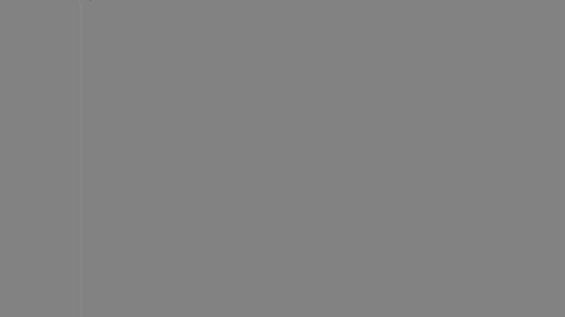 A vertical line cuts through the frame, a lighter shade against the grey. It's a simple, stark composition.
