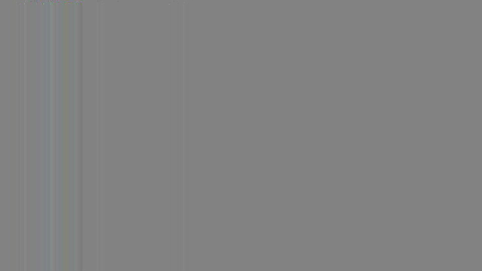 Vertical lines of varying shades of grey and green are visible. The image is largely a solid gray.

