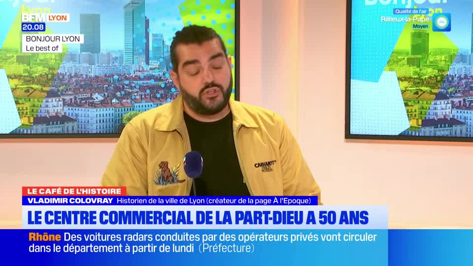 A man in a yellow jacket speaks into a microphone, the BFM Lyon logo visible in the corner. The lower third of the screen announces a segment on the Part-Dieu shopping center in Lyon.
