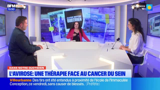 A man and two women sit at a white desk in a studio. The woman in the center gestures as she speaks, her dark hair falling around her shoulders. A BFM Lyon chyron scrolls at the bottom of the screen. A man and two women sit at a white desk in a studio. The woman in the center gestures as she speaks, her dark hair falling around her shoulders. A BFM Lyon chyron scrolls at the bottom of the screen.