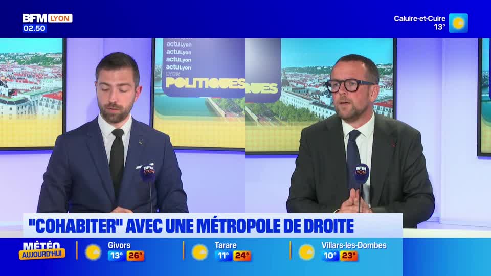 Two men in suits are seated, speaking into microphones. Behind them, screens display cityscapes and the BFM Lyon logo. A banner reads "COHABITER" AVEC UNE MÉTROPOLE DE DROITE.