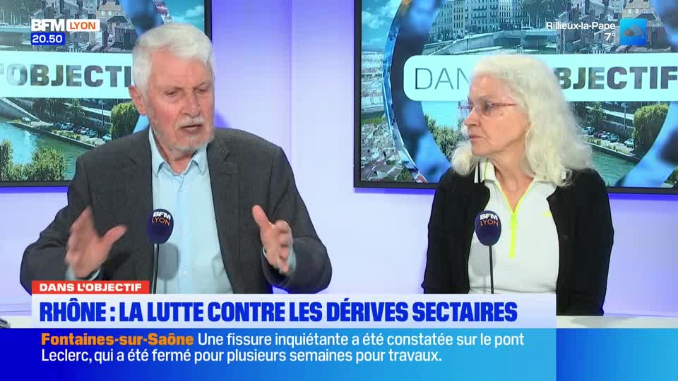 A man with white hair gestures with both hands as he speaks into a microphone. To his right, a woman with long white hair looks on, her hands clasped in her lap. A BFM Lyon chyron below them reads "RHÔNE : LA LUTTE CONTRE LES DÉRIVES SECTAIRES." A man with white hair gestures with both hands as he speaks into a microphone. To his right, a woman with long white hair looks on, her hands clasped in her lap. A BFM Lyon chyron below them reads "RHÔNE : LA LUTTE CONTRE LES DÉRIVES SECTAIRES."