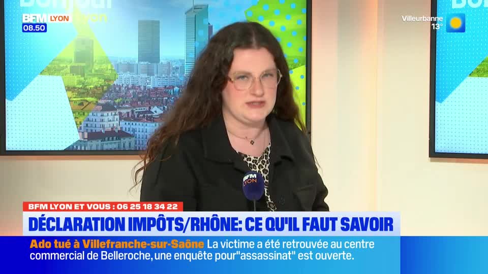 A woman with long, dark, curly hair and glasses speaks into a microphone. Behind her, a screen displays the BFM Lyon logo and a cityscape.