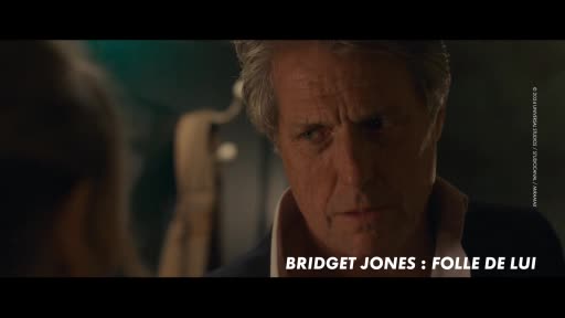 A man with graying hair stares intently, his expression a mix of concern and something more. The title "Bridget Jones: Folle de Lui" is displayed at the bottom of the screen.
