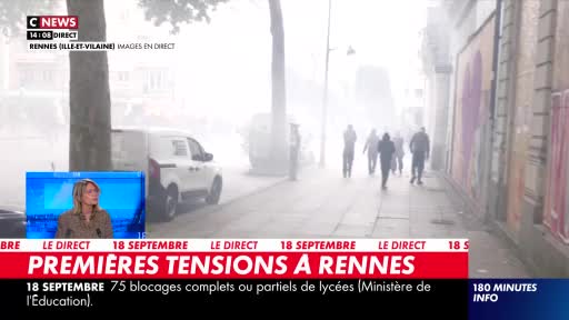 A thick haze obscures the street, where several figures are walking away from me. The CNews broadcast from Rennes, France, shows a news anchor in the lower left, reporting on the day's events.
