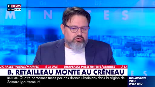 A man with a full beard and glasses is speaking directly into the camera, his mouth moving. The CNews logo is visible in the upper left corner, and headlines about Palestine and Russia scroll along the bottom.

