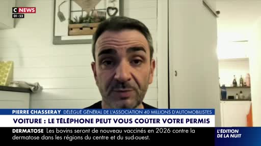 A man with dark hair and a serious expression looks directly at me, speaking. Below him, a CNews chyron announces a segment about driving and phone use.