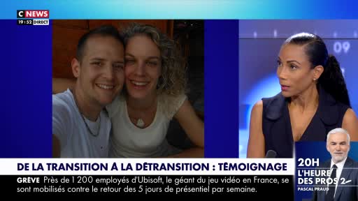A smiling couple is pictured in a photo on the left, while a woman in a dark top speaks on a television program on the right. Below them, text scrolls, mentioning a strike by Ubisoft employees in France.