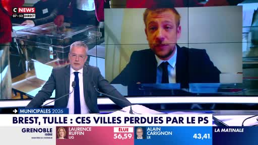 A man in a suit and tie speaks into a microphone, looking directly ahead. On a screen behind him, another man in a suit and tie appears, his expression serious. News graphics flash below, detailing election results from French municipalities. A man in a suit and tie speaks into a microphone, looking directly ahead. On a screen behind him, another man in a suit and tie appears, his expression serious. News graphics flash below, detailing election results from French municipalities.