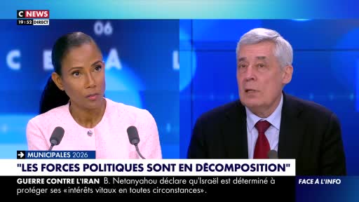 A woman in a pink jacket and a man in a dark suit with a red tie are speaking on a CNews broadcast in France. Text overlays indicate a discussion about municipal elections and a statement from B. Netanyahu regarding Israel's determination to protect its interests. A woman in a pink jacket and a man in a dark suit with a red tie are speaking on a CNews broadcast in France. Text overlays indicate a discussion about municipal elections and a statement from B. Netanyahu regarding Israel's determination to protect its interests.
