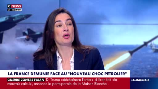 A missile streaks across the screen, trailing fire. Behind it, fighter jets are visible against a hazy blue background. A missile streaks across the screen, trailing fire. Behind it, fighter jets are visible against a hazy blue background.