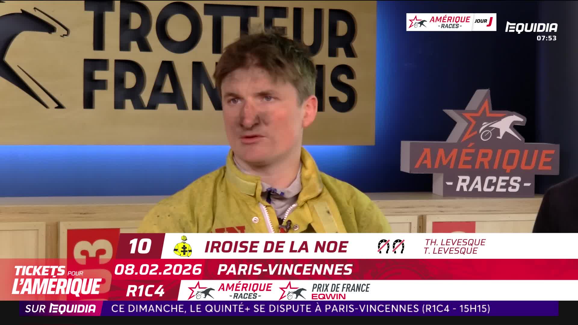 A man in a yellow racing jacket speaks, his face smudged with dirt. Below him, a graphic displays "Iroise de la Noe" and the date 08.02.2026, indicating a race at Paris-Vincennes.