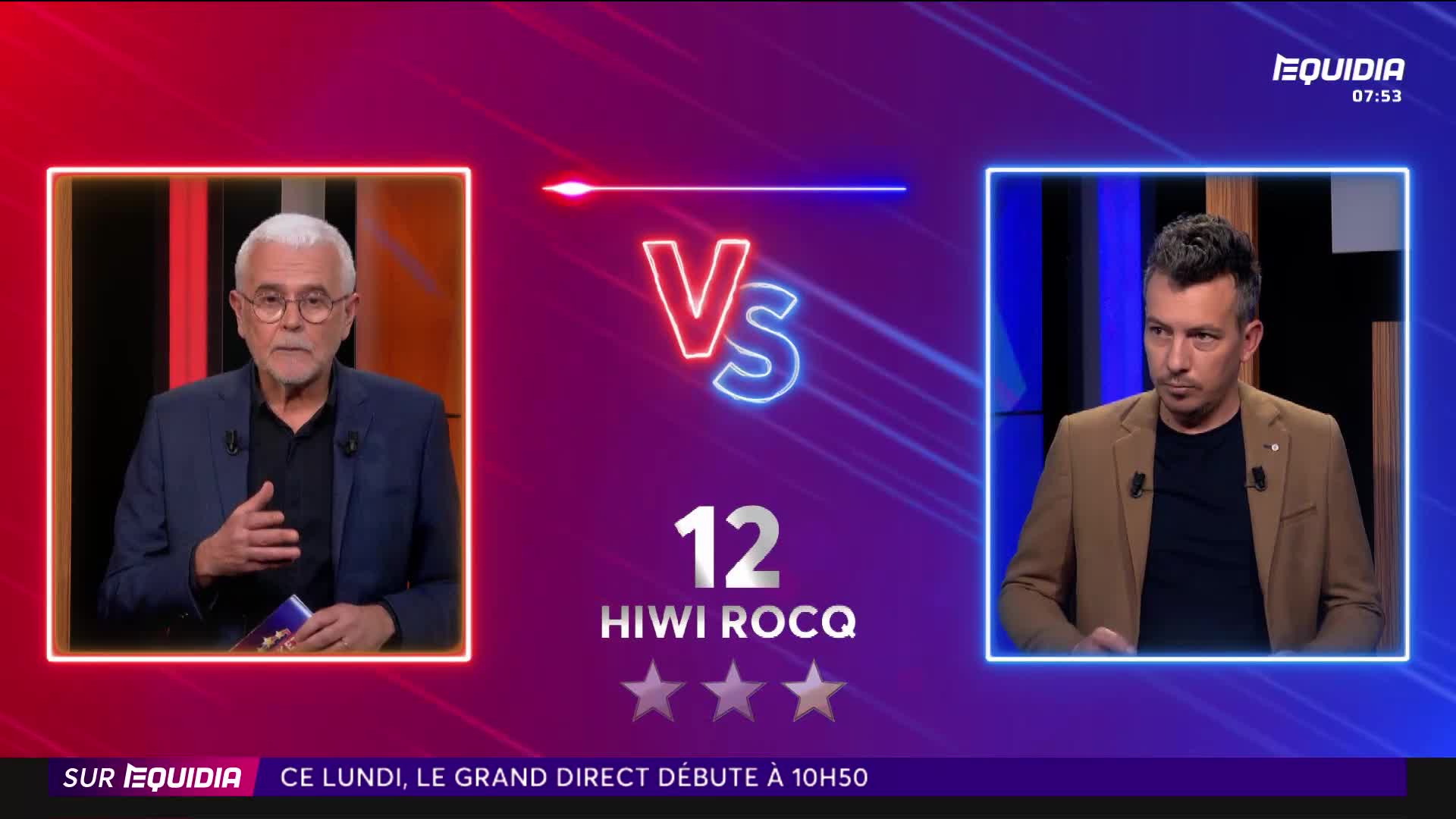 Two men are on screen, framed in glowing boxes. The man on the left, wearing a dark suit, gestures as he speaks. The man on the right, in a tan jacket, looks intently forward. Two men are on screen, framed in glowing boxes. The man on the left, wearing a dark suit, gestures as he speaks. The man on the right, in a tan jacket, looks intently forward.