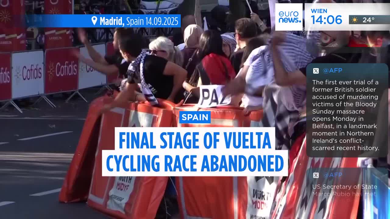 People are gathered behind orange barriers, some waving their arms. The Euronews English headline announces the final stage of the Vuelta cycling race has been abandoned in Spain.
