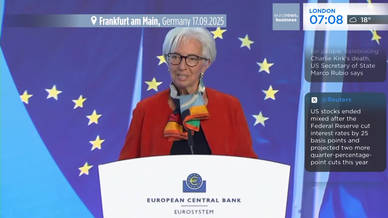 A woman in a red jacket speaks from behind a podium bearing the European Central Bank logo. Euronews English is broadcasting from London, with news headlines scrolling on the screen.
