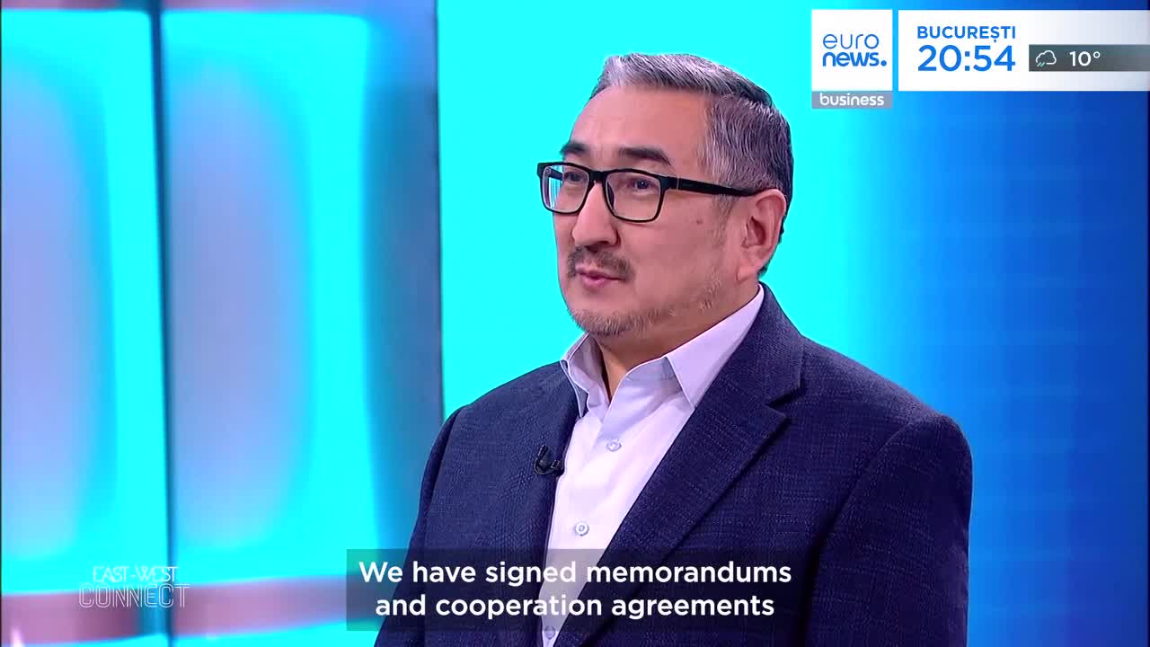 A man in a suit speaks, his words appearing on screen in English. The Euronews logo and Bucharest time are visible in the corner.