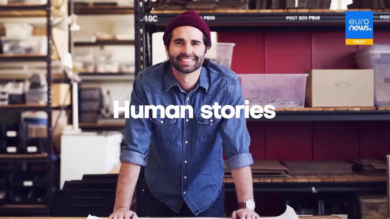 A young man in a denim shirt and beanie stands in a workshop, smiling. White text overlays the image, reading "Human stories," with the Euronews logo in the corner.