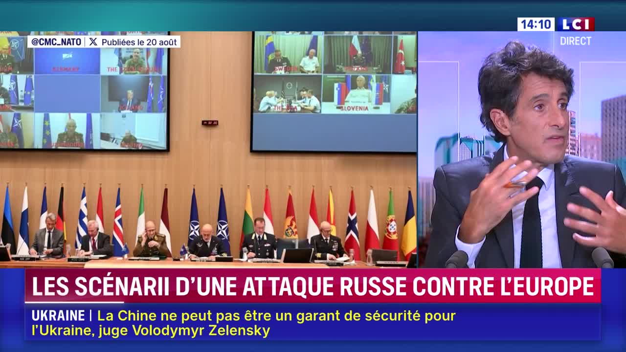On the screen, a man in a suit gestures emphatically during a live broadcast on LCI. Behind him, a split-screen shows a video conference with various flags and people.
