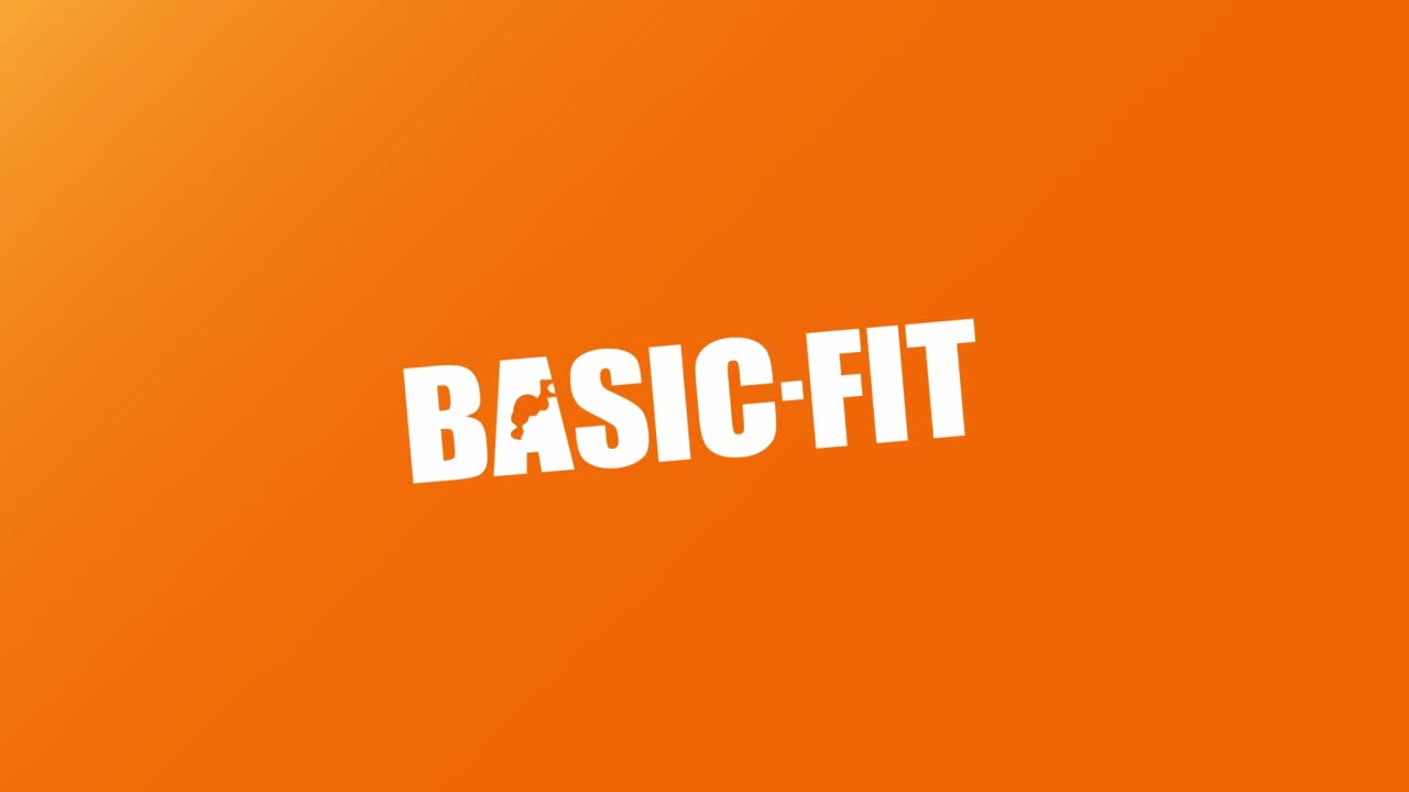 Against a vibrant orange backdrop, the words "BASIC-FIT" are displayed in bold, white letters. A small, stylized figure is integrated into the "A" of the word "BASIC."
