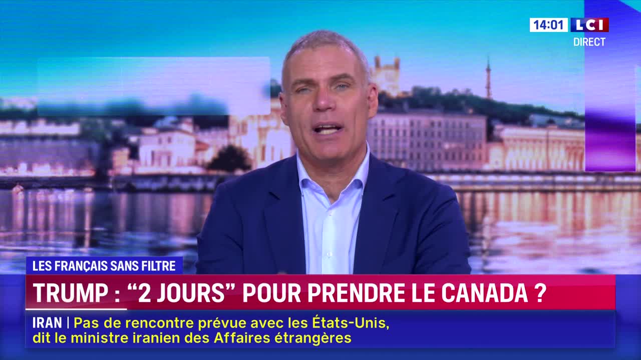 A man in a suit speaks directly to the camera, with a cityscape behind him. A news ticker scrolls across the bottom of the screen, displaying headlines from France.