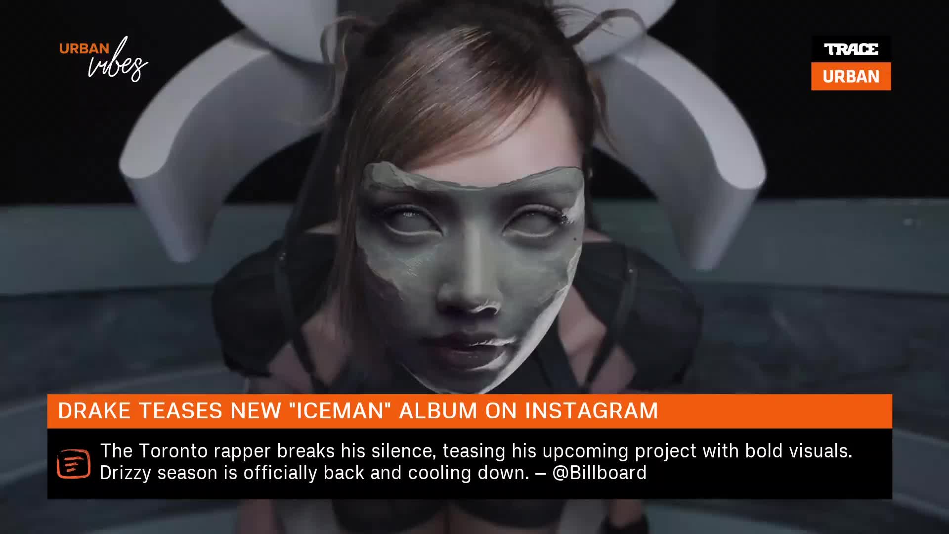 The camera focuses on a person's face, their eyes blank white, with a grey, textured mask covering their nose and cheeks. A banner at the bottom announces Drake's new "Iceman" album, hinting at a new era for the Toronto rapper. The camera focuses on a person's face, their eyes blank white, with a grey, textured mask covering their nose and cheeks. A banner at the bottom announces Drake's new "Iceman" album, hinting at a new era for the Toronto rapper.