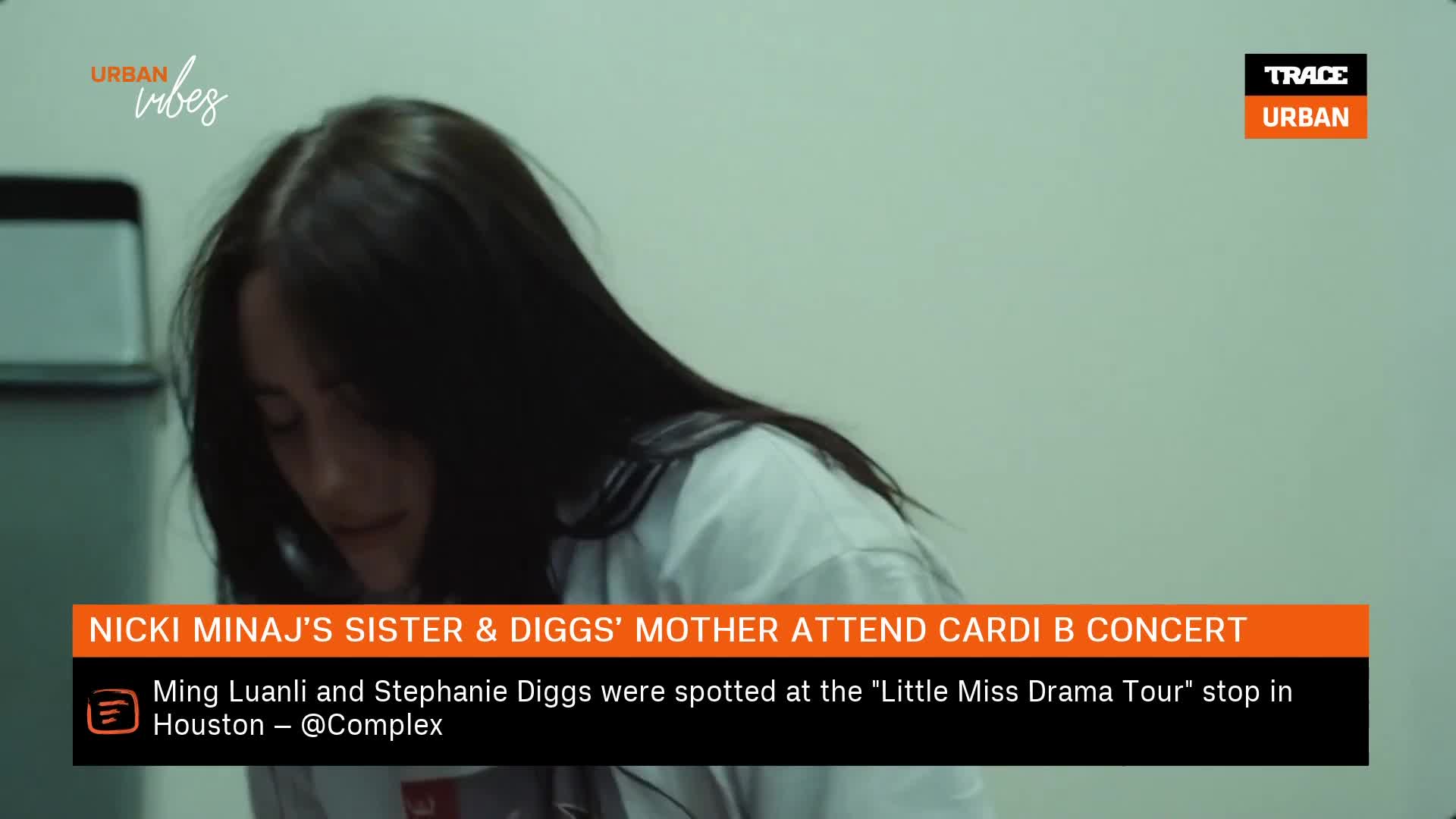 The Trace Urban logo sits in the corner, a reminder of the broadcast. A woman with long dark hair, wearing a white shirt, looks down.