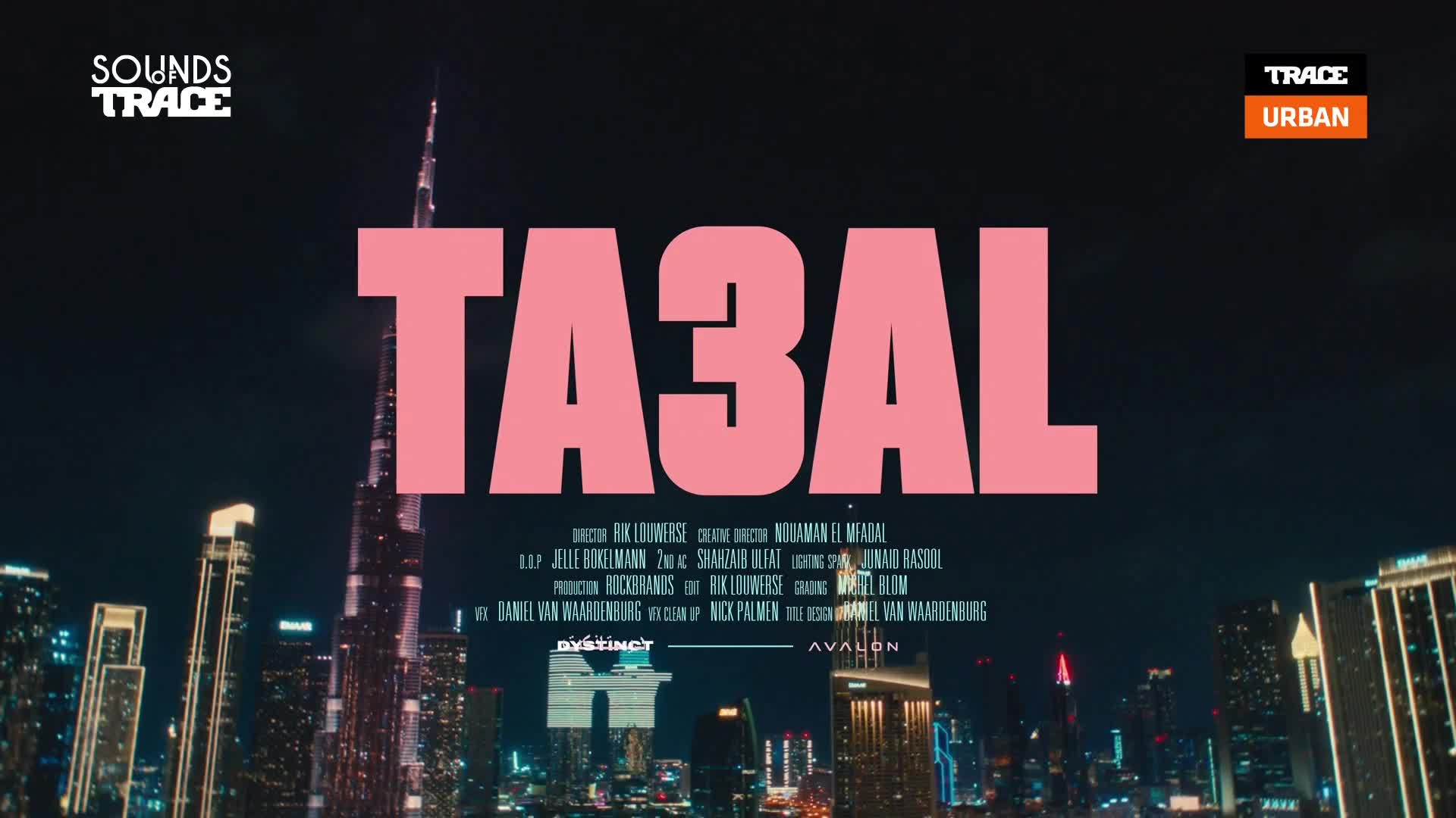 The skyline of Dubai stretches out under a dark sky, punctuated by the towering Burj Khalifa. A massive pink title, "TA3AL," dominates the frame, with "SOUNDS TRACE" and "TRACE URBAN" branding visible.