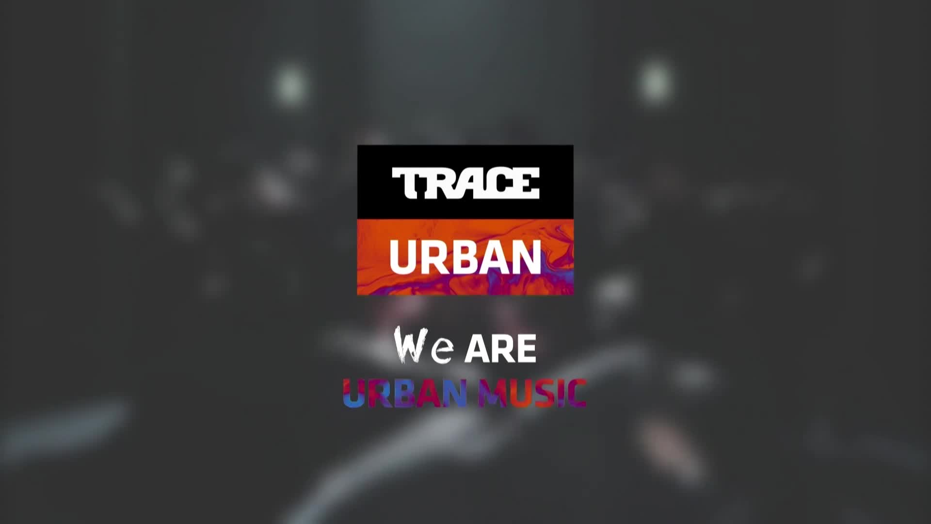 A logo for Trace Urban, a French music channel, hovers over a blurred crowd. The text "We are URBAN MUSIC" glows beneath it.