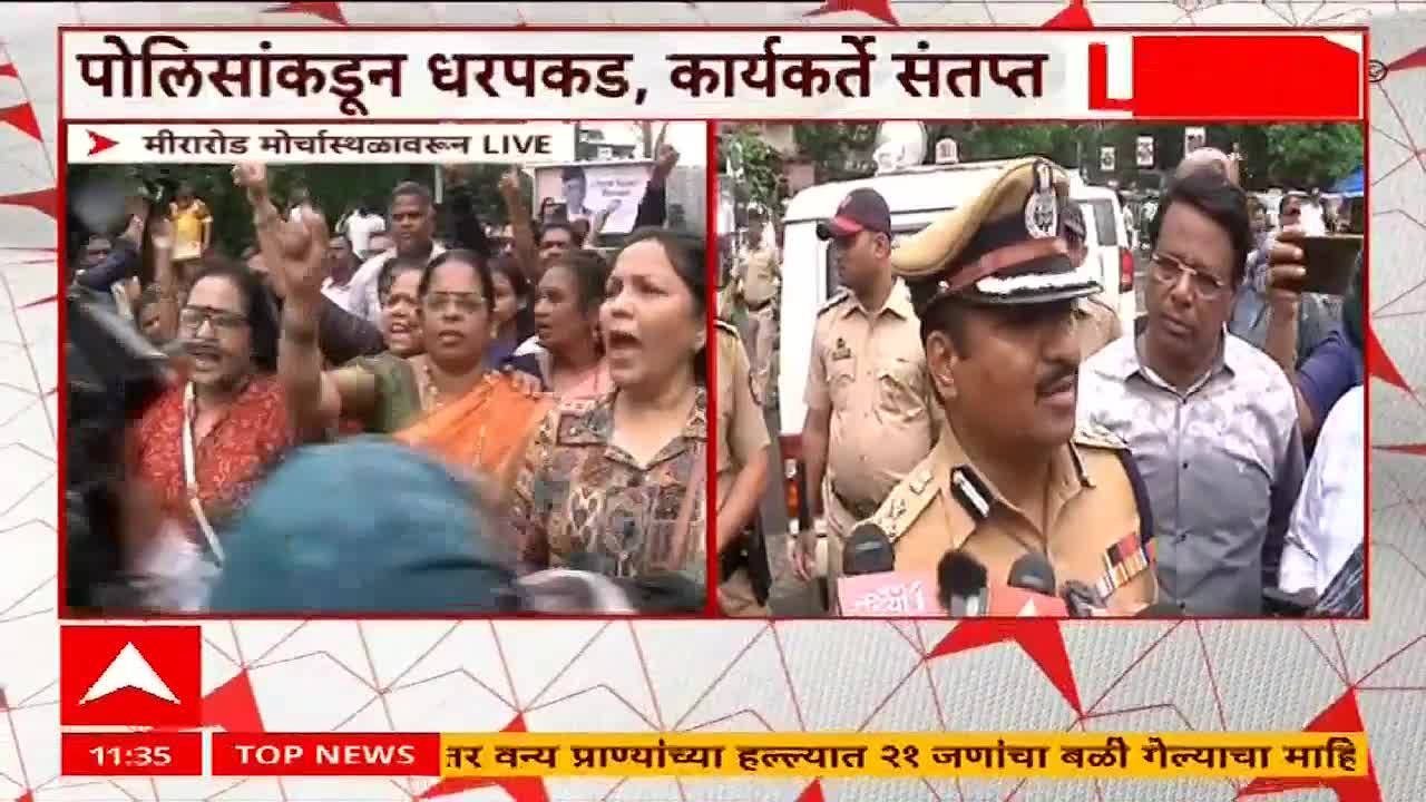 A crowd of people, some with raised fists, are shouting, while a police officer in uniform speaks into microphones. The ABP Majha news graphic indicates the event is live from a protest site in Mira Road, India.
