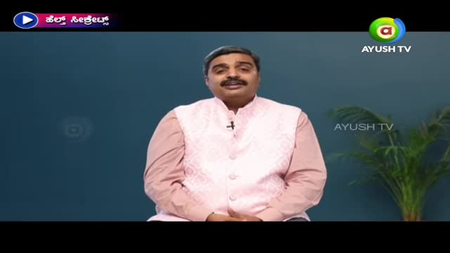 On Ayush TV, a man in a pink shirt and vest is speaking, a small plant behind him to the right. The "Health Secrets" logo is visible in the top left corner.
