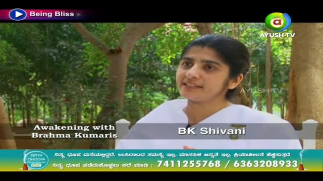 BK Shivani is speaking, framed against a backdrop of trees, with the Ayush TV logo visible. The bottom of the screen displays contact information in what looks like Kannada script.
