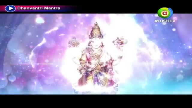 A radiant figure, adorned in traditional Indian attire, emerges from a swirling, ethereal light. The Ayush TV logo appears in the corner, beside the title "Dhanvantri Mantra."